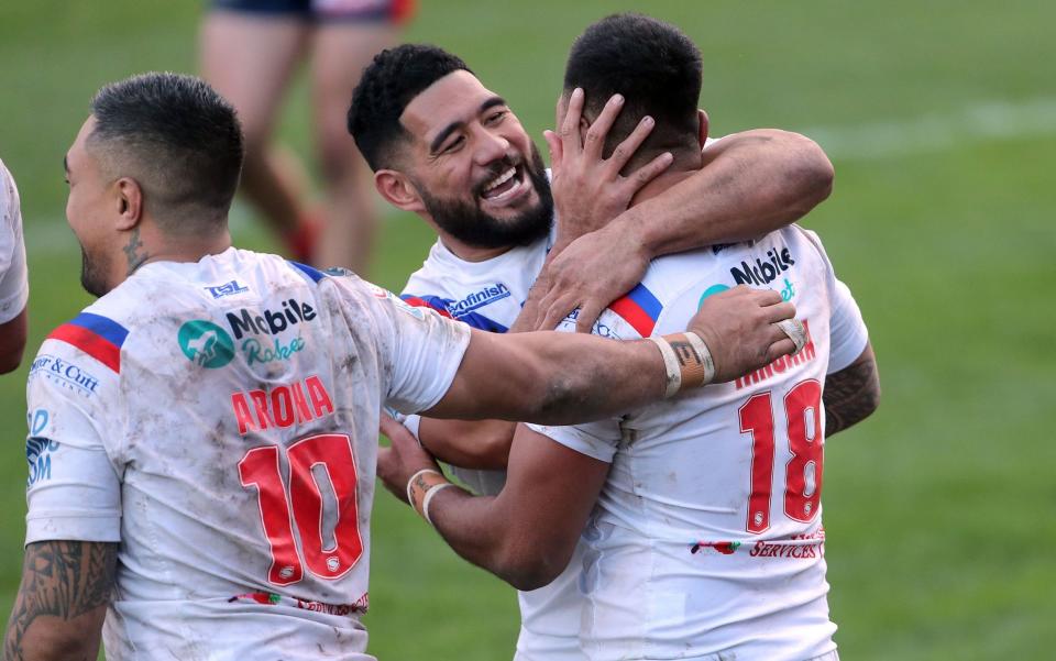 Adam Tangata celebrates scoring a try with Wakefield now facing back-to-back matches against local rivals Leeds  - PA