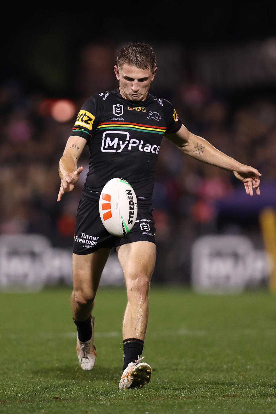 PENRITH, AUSTRALIA - MAY 10:  Jack Cole of the Panthers kicks the ball during the round 10 NRL match between Penrith Panthers and Canterbury Bulldogs at BlueBet Stadium on May 10, 2024, in Penrith, Australia. (Photo by Jason McCawley/Getty Images)