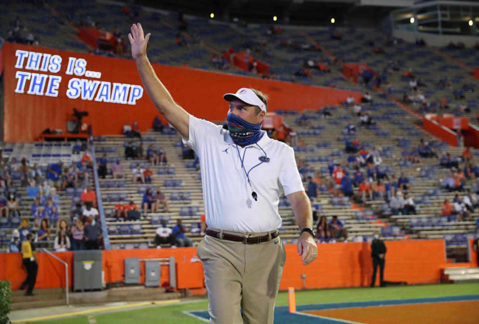 Florida coach Dan Mullen waves to the crowd before a game against Missouri at Ben Hill Griffin Stadium on Oct.31, 2020. (Alex de la Osa/Collegiate Images/Getty Images)