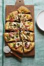 <p>Forget red sauce — deck out your pizza with yellow mustard, baked ham, Gruyère cheese, onions, and dill pickles.</p><p><a href="https://www.womansday.com/food-recipes/food-drinks/recipes/a56182/pizza-cubano-recipe/" rel="nofollow noopener" target="_blank" data-ylk="slk:Get the recipe for Pizza Cubano.;elm:context_link;itc:0;sec:content-canvas" class="link "><em>Get the recipe for Pizza Cubano.</em></a></p>