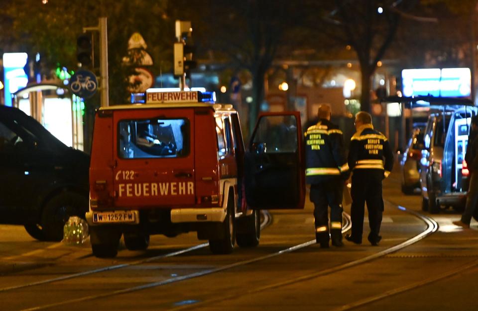 Firefighters and police cars stand near Schwedenplatz square following a shooting in the center of Vienna on November 2, 2020,. - Two people, including one attacker, have been killed in a shooting in central Vienna, police said late November 2, 2020. At least one attacker was still at large after a terror attack Monday evening in Vienna which killed one person, Austrian Interior Minister Karl Nehammer said, with another assailant shot dead. (Photo by Joe Klamar / AFP) (Photo by JOE KLAMAR/AFP via Getty Images)