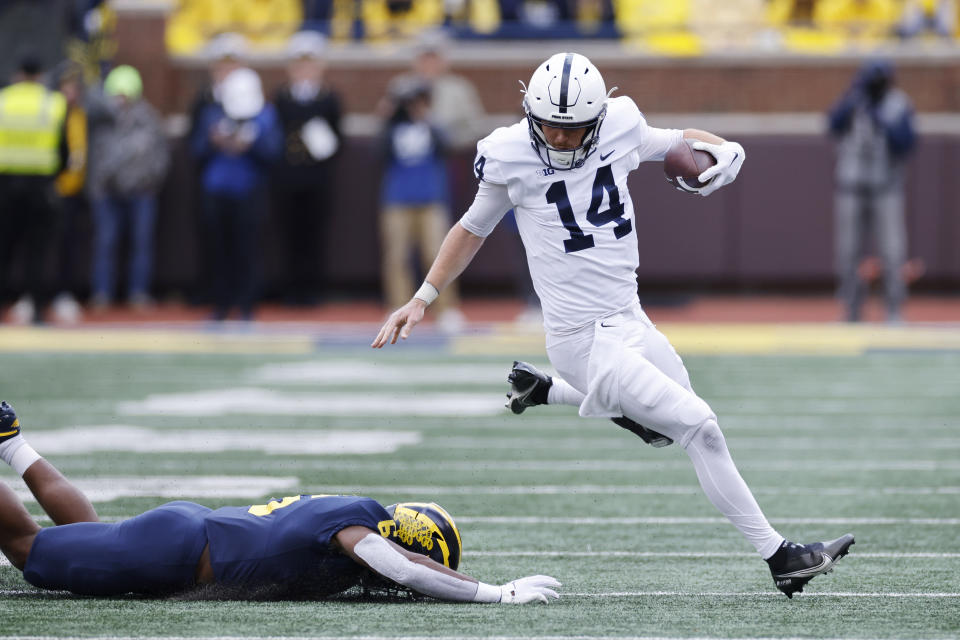 ANN ARBOR, MI - OCTOBER 15: Penn State Nittany Lions quarterback Sean Clifford (14) runs with the ball during a college football game against the Michigan Wolverines on October 15, 2022 at Michigan Stadium in Ann Arbor, Michigan. (Photo by Joe Robbins/Icon Sportswire via Getty Images)