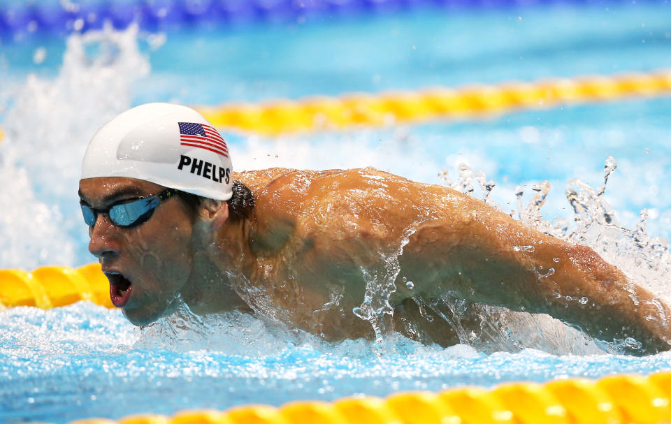 LONDON, ENGLAND - JULY 30: Michael Phelps of the United States competes in heat 5 of the Men's 200m Butterfly on Day 3 of the London 2012 Olympic Games at the Aquatics Centre on July 30, 2012 in London, England. (Photo by Clive Rose/Getty Images)