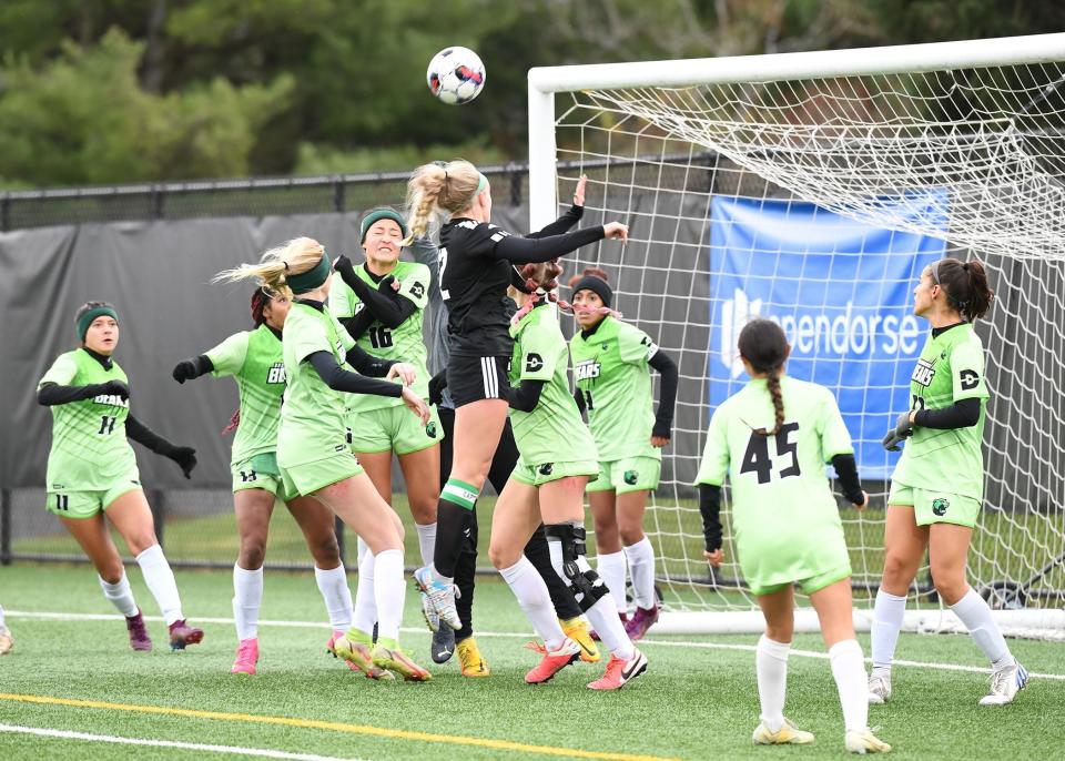 Jazmyn Gillette leaps to head the ball for Mohawk Valley Community College during the NJCAA's Division III championship match against Dallas College-Brookhaven Sunday in Herkimer.