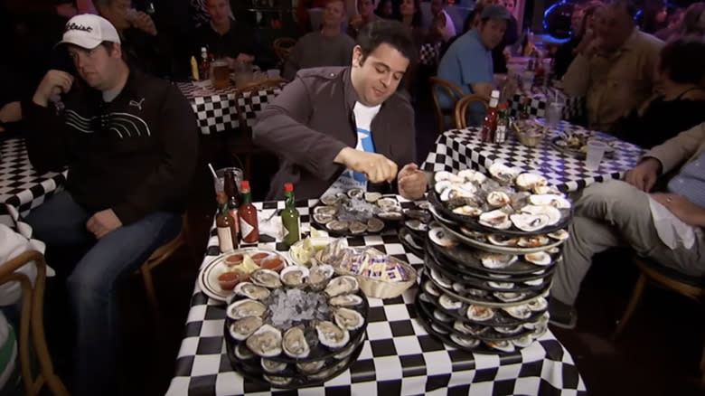 Adam Richman plates of oysters