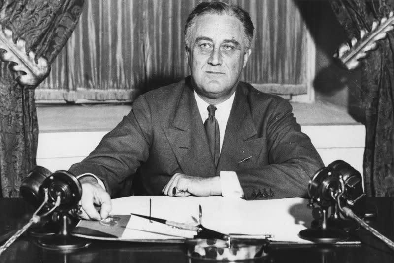 President Franklin Delano Roosevelt addresses the nation during a radio broadcast from the White House on May 8, 1933. He gave his first so-called "fireside chat" on March 12, 1933. UPI File Photo