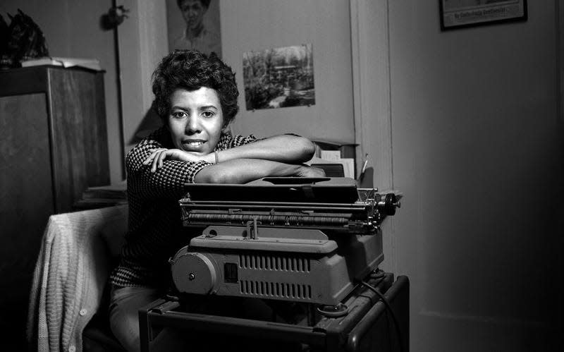 Lorraine Hansberry poses for a portrait in her apartment at 337 Bleecker Street in April, 1959 in New York City, New York.