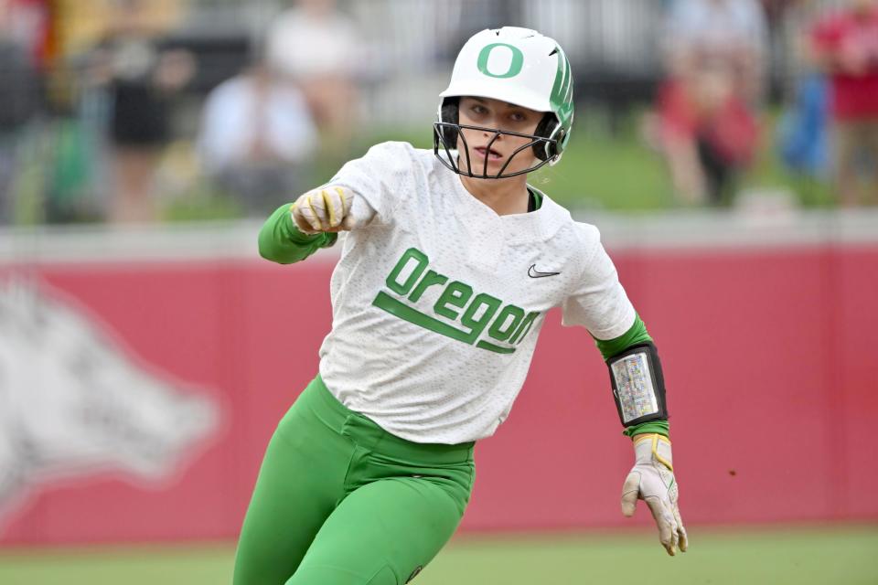 Oregon's Paige Sinicki (38) rounds third base on her way to score a run against Notre Dame during an NCAA softball game on Friday, May 19, 2023, in Fayetteville, Ark.