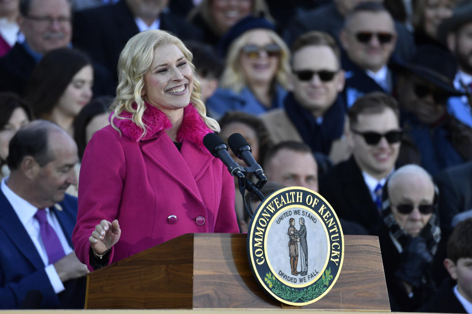 Kentucky First Lady Britainy Beshear speaks to the audience gathered on the steps of the Kentucky State Capitol to witness the public swearing in of her husband, Ky. Governor Andy Beshear in Frankfort, Ky., Tuesday, Dec. 12, 2023. (AP Photo/Timothy D. Easley)