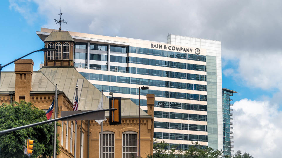 Dallas, USA - June 7, 2019: Downtown cityscape buildings in city near Klyde Warren park with sign for Bain & Company - Image.