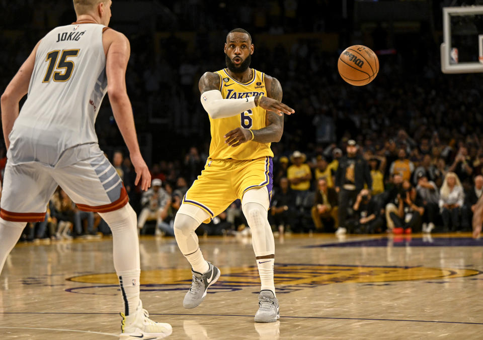 LOS ANGELES, CA - MAY 22: LeBron James (6) of the Los Angeles Lakers passes as Nikola Jokic (15) of the Denver Nuggets defends during the fourth quarter of the Nuggets' 113-111 Western Conference finals game 4 win at Crypto.com Arena in Los Angeles on Monday, May 22, 2023. The Nuggets swept the best-of-seven series 4-0 to advance to their first NBA Finals in franchise history. (Photo by AAron Ontiveroz/The Denver Post)