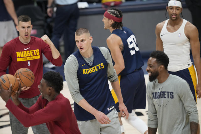 Denver Nuggets center Nikola Jokic (15) as players take part in practice for Game 1 of the NBA basketball finals against the Miami Heat Wednesday, May 31, 2023, in Denver. (AP Photo/David Zalubowski)