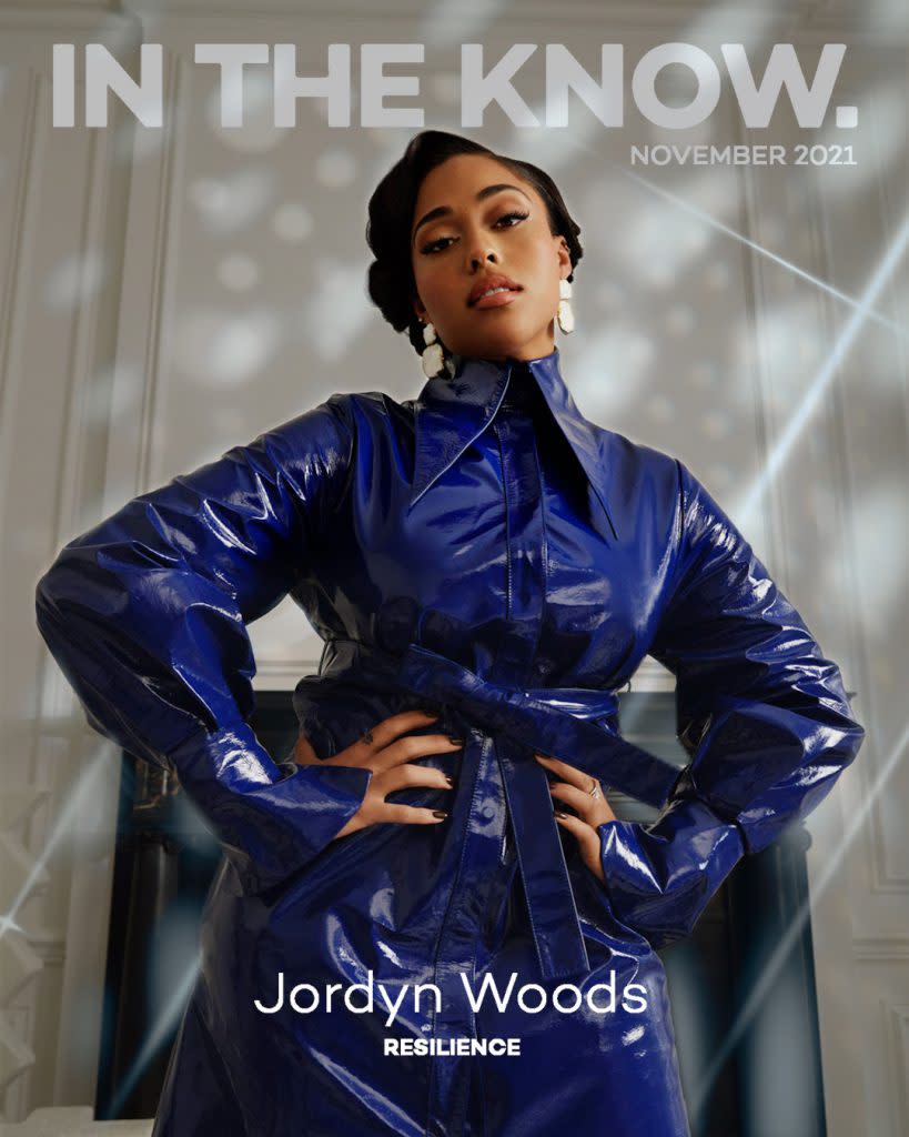 Jordyn Woods on In The Know’s November digital cover. She’s wearing a <a href="https://fave.co/3EEms9Q" rel="noopener" target="_blank" data-ylk="slk:16Arlington patent leather coat;elm:context_link;itc:0;sec:content-canvas" class="link ">16Arlington patent leather coat</a>, Joanna Laura Constantine <a href="https://www.intheknow.com/tag/jewelry/?utm_source=internallinks&utm_medium=internallinkstransactions&utm_campaign=internallinksjewelry" data-ylk="slk:earrings;elm:context_link;itc:0;sec:content-canvas" class="link ">earrings</a>, a <a href="https://fave.co/3pYoLQD" rel="noopener" target="_blank" data-ylk="slk:Yun Yun Sung ring;elm:context_link;itc:0;sec:content-canvas" class="link ">Yun Yun Sung ring</a> and <a href="https://fave.co/3BCaGL9" rel="noopener" target="_blank" data-ylk="slk:Larroude boots;elm:context_link;itc:0;sec:content-canvas" class="link ">Larroude boots</a>.<br>Photo by <a href="https://www.instagram.com/sheekswinsalways/?hl=en" rel="nofollow noopener" target="_blank" data-ylk="slk:Shaniqwa Jarvis;elm:context_link;itc:0;sec:content-canvas" class="link ">Shaniqwa Jarvis</a>