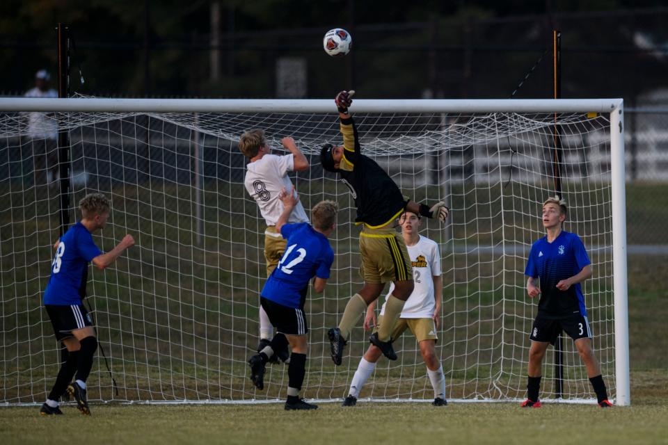 Jasper's Chase Spears (0) blocks a shot at the net during the second half of the 3A sectional semifinal at Castle Soccer Stadium in Newburgh, Ind., Wednesday, Oct. 7, 2020. The Knights defeated the Wildcats 2-1 to advance to Saturday’s 3A sectional championship game against the North Huskies.