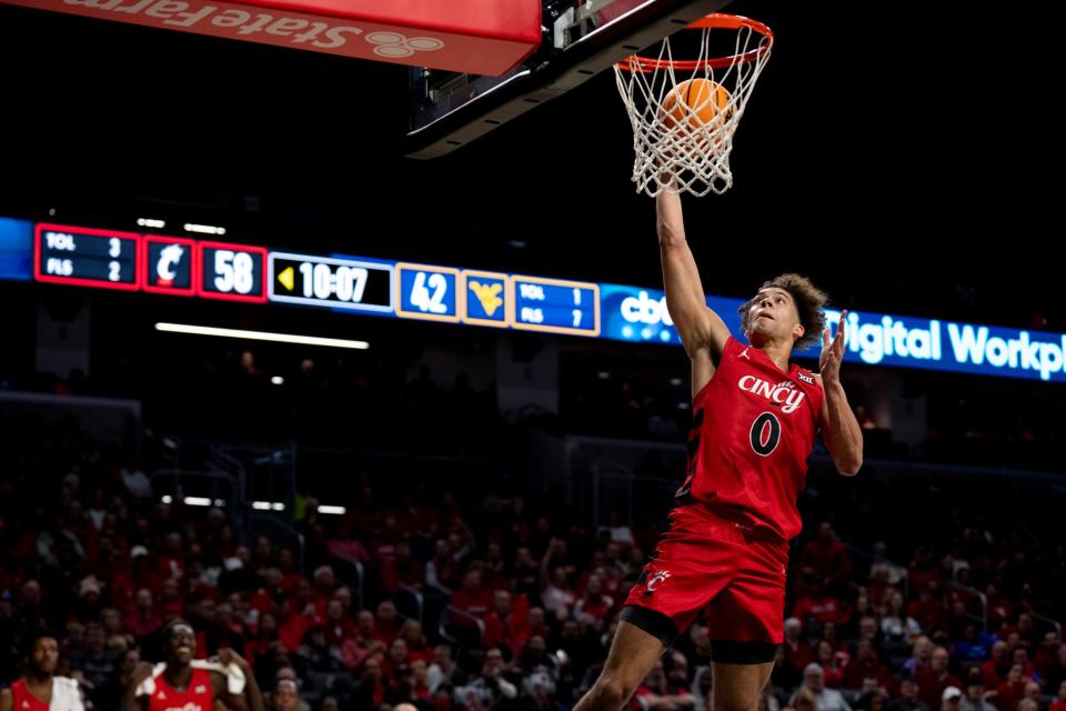 Dan Skillings Jr. dunks in UC's 92-56 win over West Virginia on Senior Day.