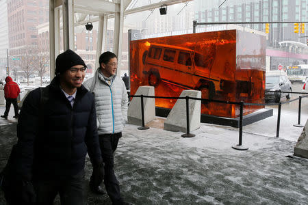 A 1979 Mercedes G-Class SUV encased in 44.4 tons of synthetic resin greets guests as they arrive at the North American International Auto Show in Detroit, Michigan, U.S. January 15, 2018. REUTERS/Jonathan Ernst