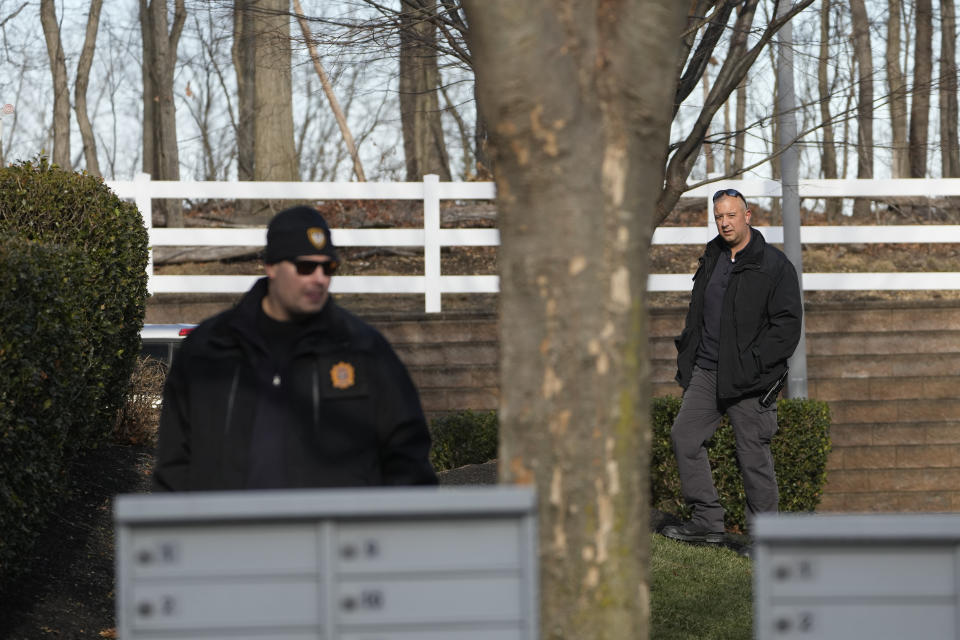 Police search near the home of Sayreville councilwoman Eunice Dwumfour in the Parlin area of Sayreville, N.J., Thursday, Feb. 2, 2023. Dwumfour was found shot to death in an SUV parked outside her home on Wednesday, Feb. 1. (AP Photo/Seth Wenig)