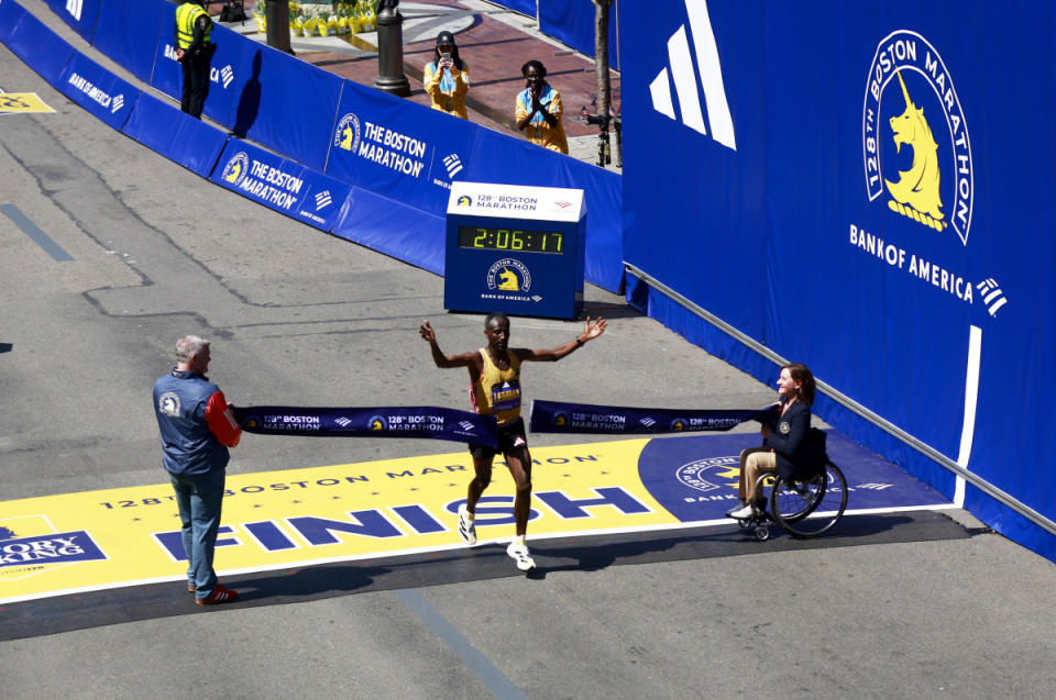 Sisay Lemma crosses the finish line at the 2024 Boston Marathon.<p>Adidas</p>