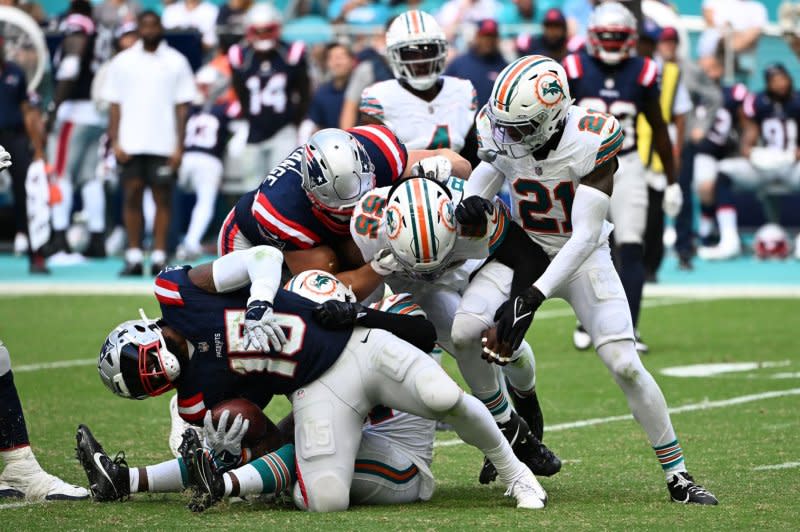 New England Patriots running back Ezekiel Elliott (L) can be plugged in as an RB2 in Week 14. File Photo by Larry Marano/UPI