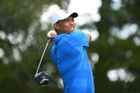 Sep 22, 2018; Atlanta, GA, USA; Tiger Woods plays his shot from the fifth tee during the third round of the Tour Championship golf tournament at East Lake Golf Club. Mandatory Credit: John David Mercer-USA TODAY Sports