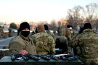 <p>Weapons are distributed to members of the National Guard outside the U.S. Capitol on January 13, 2021 in Washington, DC.</p>