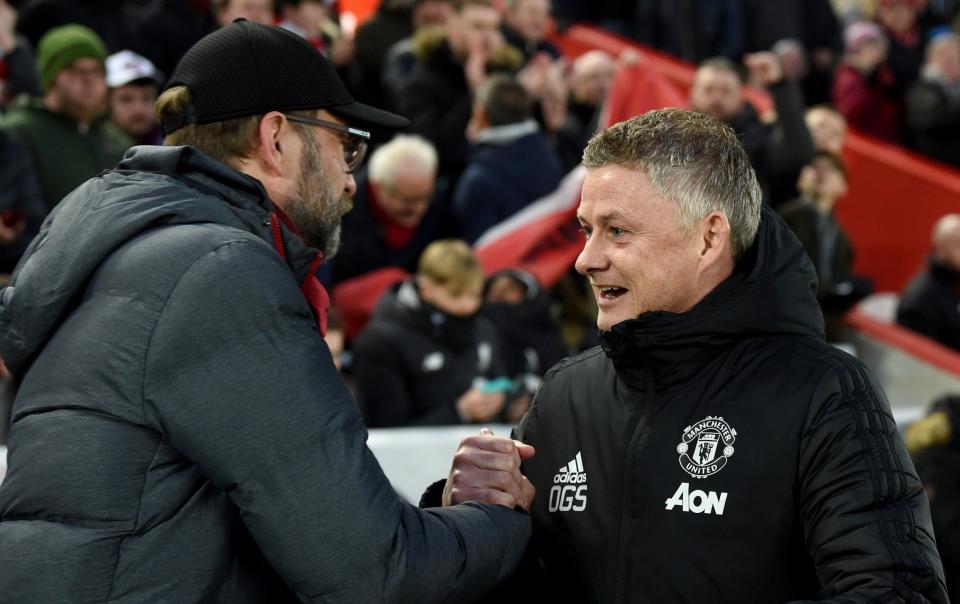 Jurgen Klopp and Ole Gunnar Solskjaer are at odds over the number of penalties Man Utd have been awarded - GETTY IMAGES