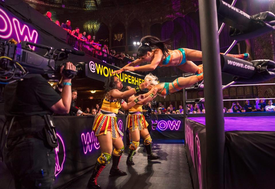 The members of Miami Sweet Heat (right) go airborne against the Tonga Twins during a tag-team match on "WOW – Women Of Wrestling."