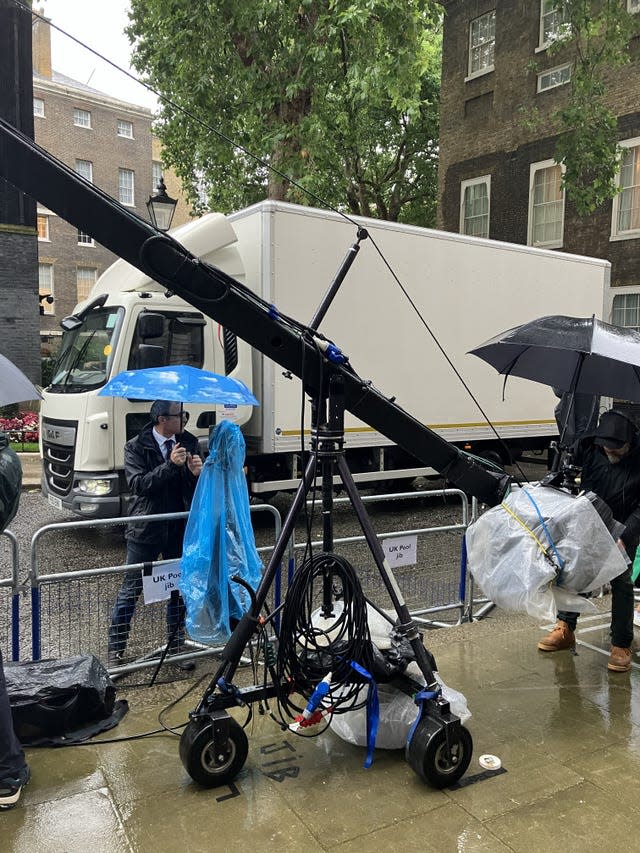 A white truck parked around the side of No 10 Downing Street