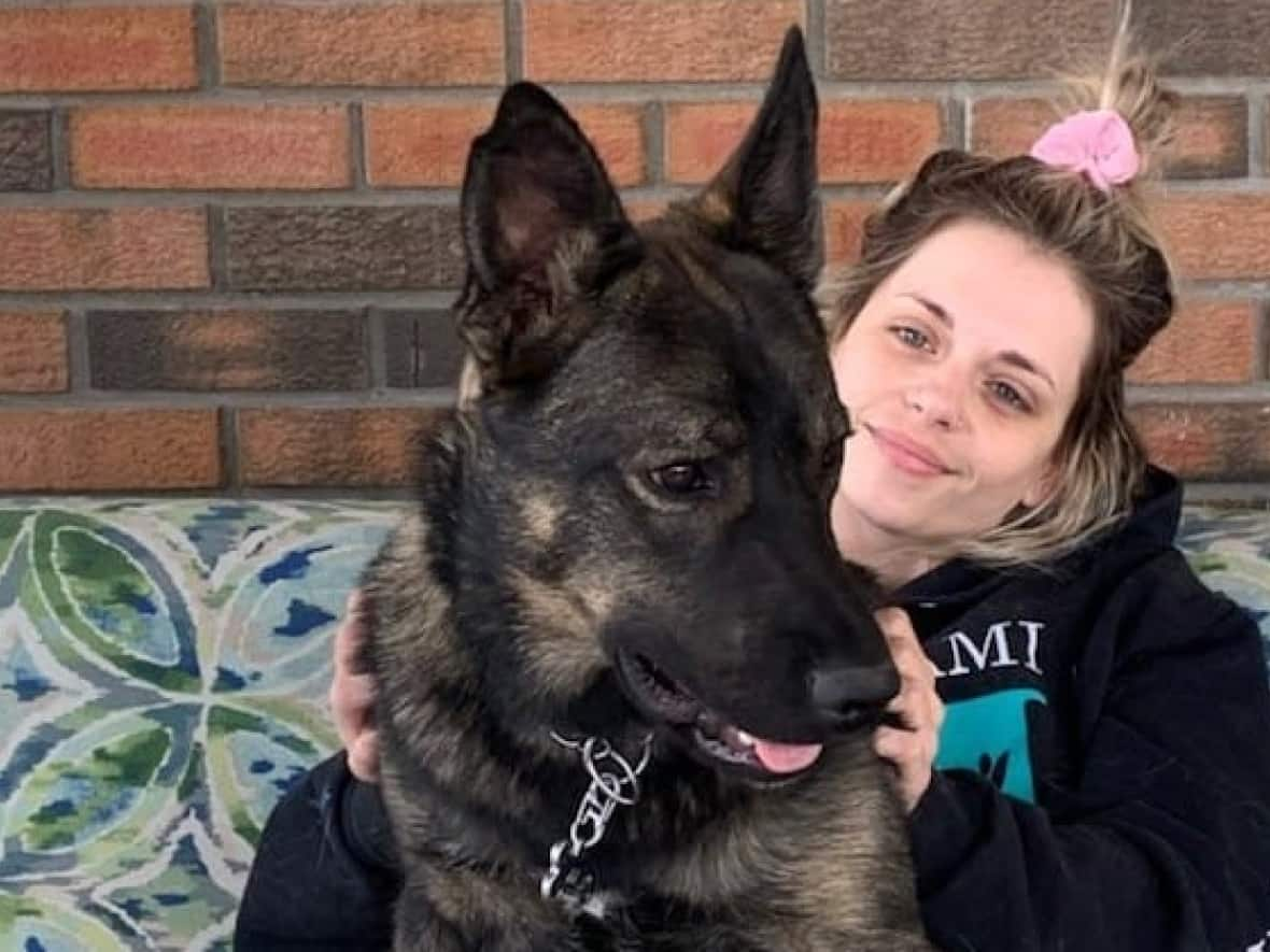 Chelsea Cardno is pictured with her German shepherd J.J. (Kelowna RCMP - image credit)