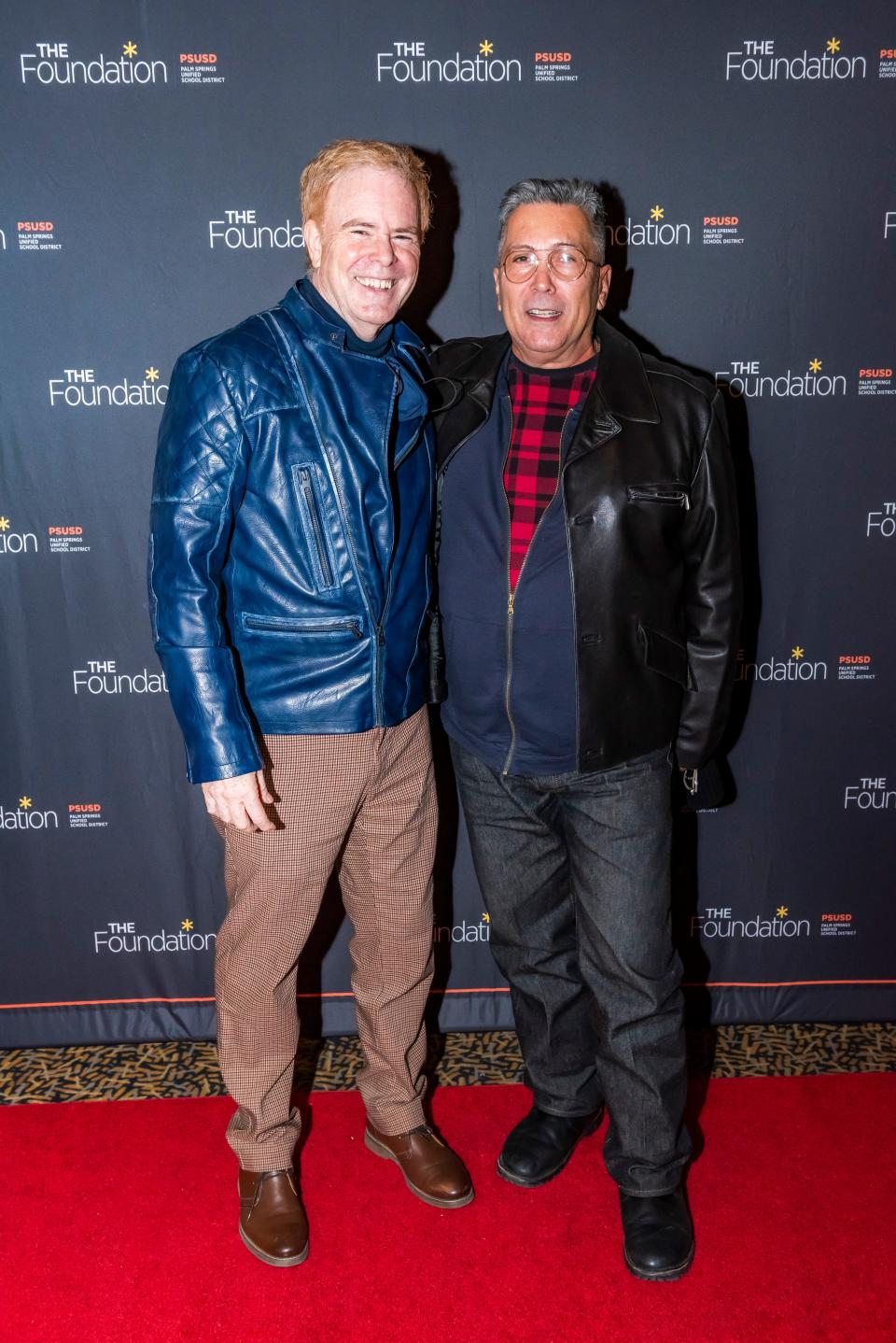 MTU founder David Green poses on the red carpet with Dimitri Halkidis at the premiere of "Blame It on the Mistletoe" at the Camelot Theatre on Dec. 16, 2021.