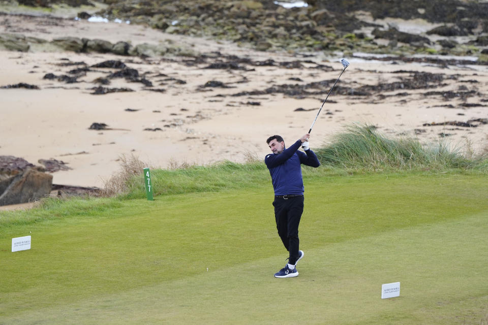 Yasir Al Rumayyan tees off the third on day two of the Alfred Dunhill Links Championship at Kingsbarns, Fife, Scotland, Friday Oct. 4, 2024. (Jane Barlow/PA via AP)