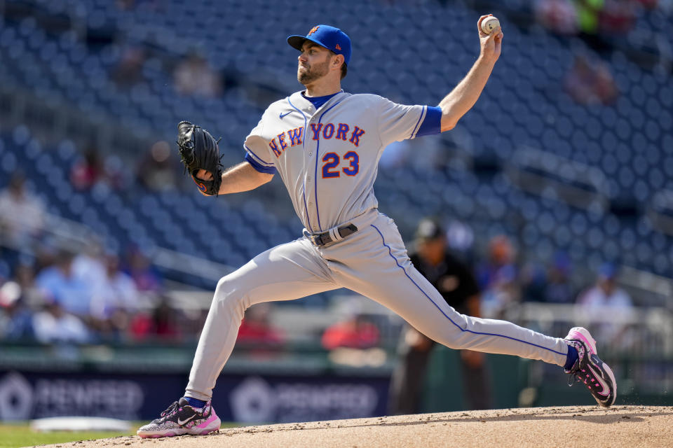 New York Mets starting pitcher David Peterson throws during the first inning of a baseball game against the Washington Nationals at Nationals Park, Monday, May 15, 2023, in Washington. (AP Photo/Alex Brandon)
