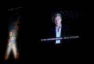 A video message by director Christopher Nolan is screened during the opening ceremony at 33rd Tokyo International Film Festival, amid the coronavirus disease (COVID-19) outbreak, in Tokyo