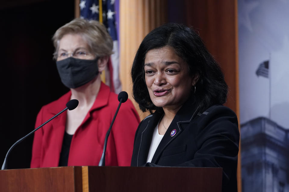 FILE - In this March 1, 2021, file photo Rep. Pramila Jayapal, D-Wash., right, with Sen. Elizabeth Warren, D-Mass., at left, speaks during a news conference on Capitol Hill in Washington. One side is energized by the prospect of the greatest expansion of government support since the New Deal nearly a century ago. The other is fearful about dramatically expanding Washington's reach at an enormous cost. They are all Democrats, yet are taking vastly different approaches to the the massive $3.5 trillion spending bill moving through Congress. (AP Photo/Susan Walsh, File)