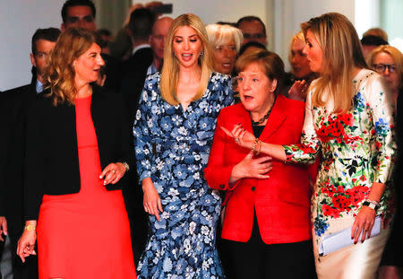 Daughter of U.S. President Ivanka Trump, German Chancellor Angela Merkel and Queen Maxima of the Netherlands, UN Secretary General's Special Advocate for Inclusive Finance for Development and Honorary Chair of the G20 Global Partnership for Financial Inclusion arrive for the family photo at the W20 Summit under the motto "Inspiring women: scaling up women's entrepreneurship" in Berlin, Germany, April 25, 2017. REUTERS/Fabrizio Bensch