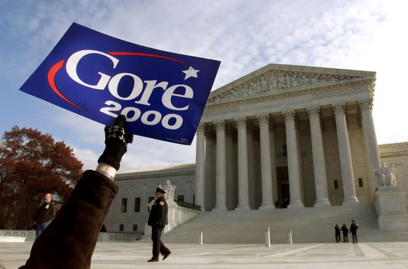 FILE PHOTO: Supporters of Vice President Al Gore demonstrate outside the U.S. Supreme Court in Washington