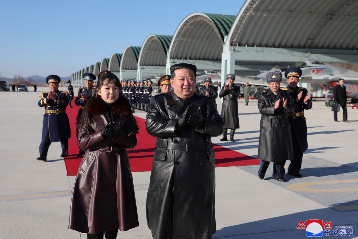 North Korean leader Kim Jong-un and his daughter visit an air force command post to commemorate what the country calls the ‘Day of Airmen’  (AP)