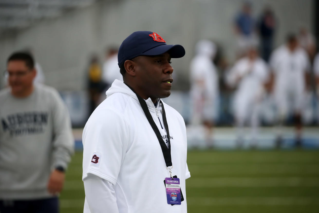 BIRMINGHAM, AL - DECEMBER 28: Auburn Tigers defensive coordinator Derek Mason watches warm ups before the TicketSmarter Birmingham Bowl between the Houston Cougars and the Auburn Tigers on December 28, 2021 at Protective Stadium in Birmingham, Alabama.  (Photo by Michael Wade/Icon Sportswire via Getty Images)
