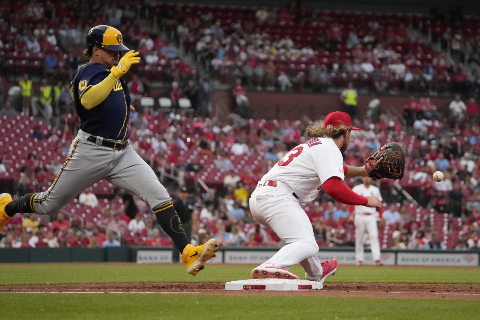 Milwaukee Brewers' Willy Adames, left, grounds out as St. Louis Cardinals first baseman Brendan Donovan handles the throw during the third inning of a baseball game Wednesday, May 17, 2023, in St. Louis. (AP Photo/Jeff Roberson)