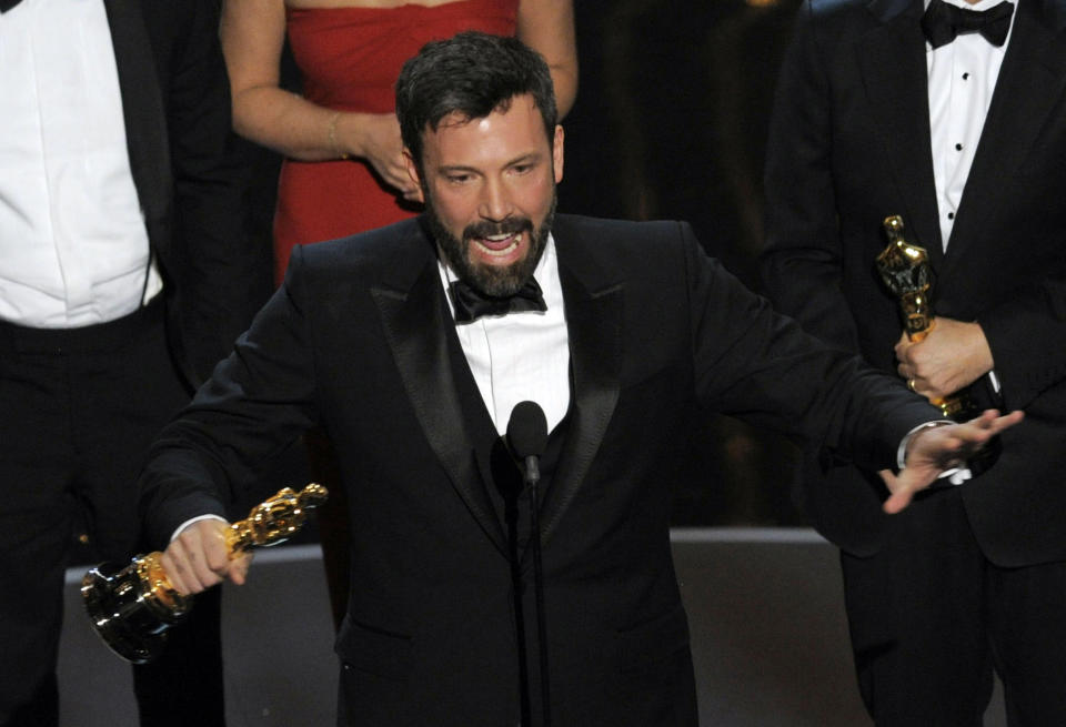 FILE - In this Sunday Feb. 24, 2013 file photo, director and producer Ben Affleck accepts the award for best picture for "Argo" during the Oscars at the Dolby Theatre, in Los Angeles. “Argo” mentions New Zealand just once in passing, but the four-word reference is rankling Kiwis five months after the Oscar-winning film was released in the South Pacific nation. Even Parliament has expressed its dismay, passing a motion stating that director Ben Affleck “saw fit to mislead the world about what actually happened.” (Photo by Chris Pizzello/Invision/AP, File)