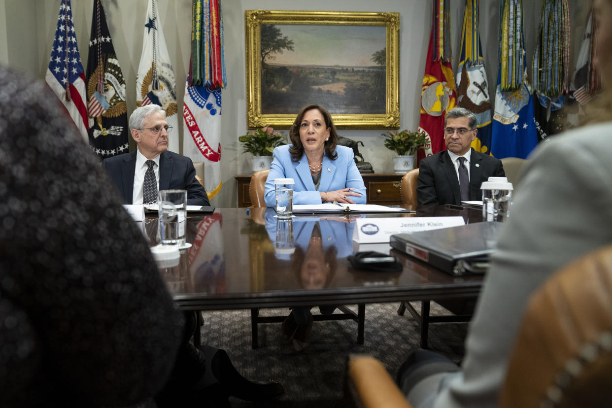 FILE - Attorney General Merrick Garland, left, and Health and Human Services Secretary Xavier Becerra, right, listen as Vice President Kamala Harris speaks during a meeting with a task force on reproductive health care access, in the Roosevelt Room of the White House, Wednesday, April 12, 2023, in Washington. (AP Photo/Evan Vucci, File)
