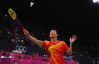 LONDON, ENGLAND - AUGUST 01: Long Chen of China returns against Wing Ki Wong of Hing Kong, China during their Men's Singles Badminton on Day 5 of the London 2012 Olympic Games at Wembley Arena at Wembley Arena on August 1, 2012 in London, England. (Photo by Michael Regan/Getty Images)