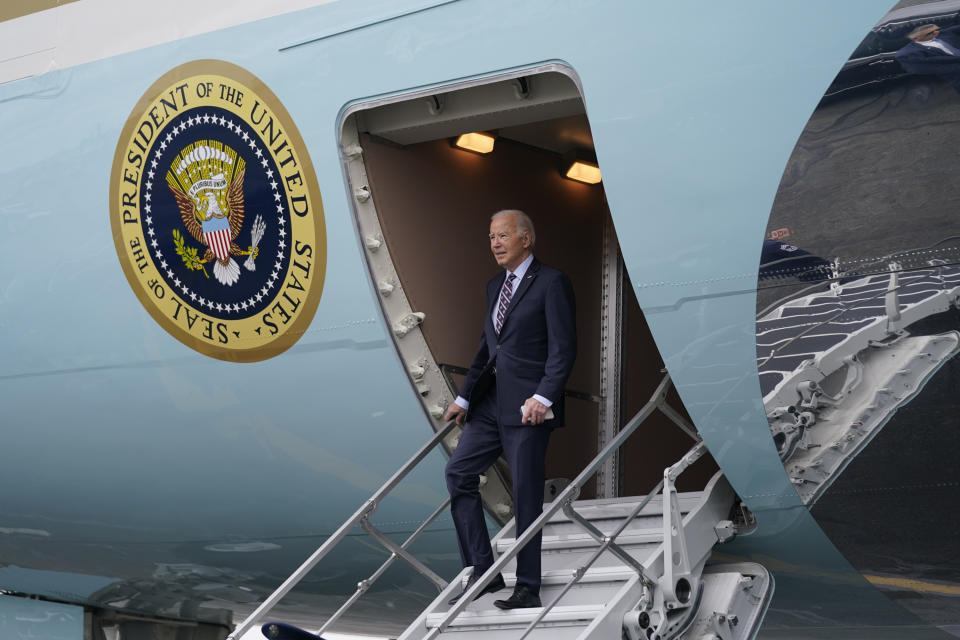 President Joe Biden arrives at Boston Logan International Airport to attend several campaign fundraisers, Tuesday, Dec. 5, 2023, in Boston. (AP Photo/Evan Vucci)