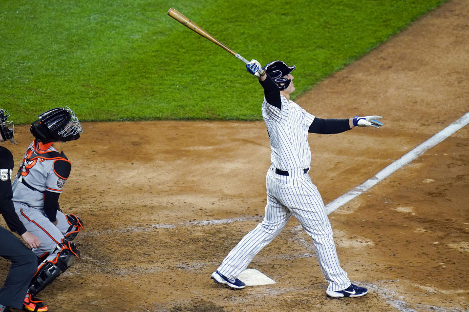 New York Yankees' Anthony Rizzo follows through for a two-run home run during the fifth inning of a baseball game against the Baltimore Orioles Tuesday, April 26, 2022, in New York. (AP Photo/Frank Franklin II)