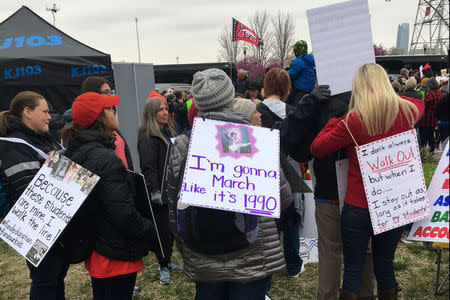 Oklahoma teachers rally outside the state Capitol in Oklahoma City, Oklahoma, U.S., April 2, 2018. REUTERS/Lenzy Krehbiel-Burton