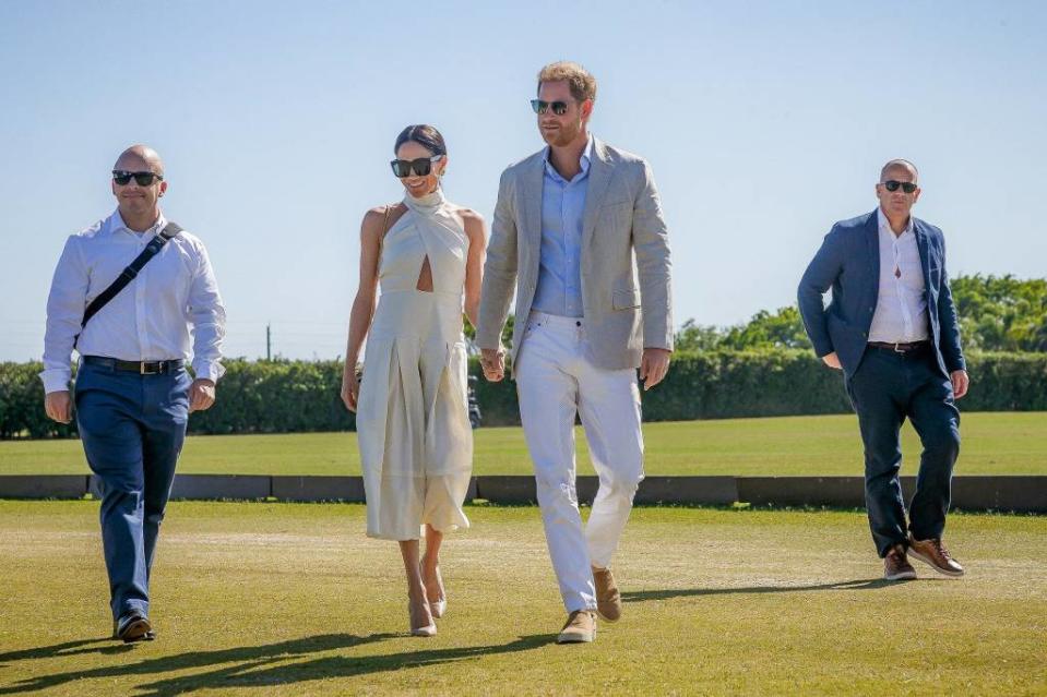 Meghan Markle and Prince Harry arrive at Grand Champions Polo in Wellington, Fla., on April 12. THOMAS CORDY/THE PALM BEACH POST / USA TODAY NETWORK