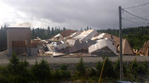 A pricey home being built in Pouch Cove collapsed when tropical storm Leslie passed through the area. 