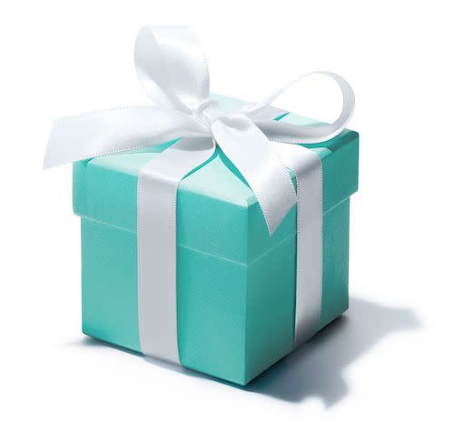 A gift from Tiffany & Co. is easily recognizable by the teal colored paper and signature white bow.