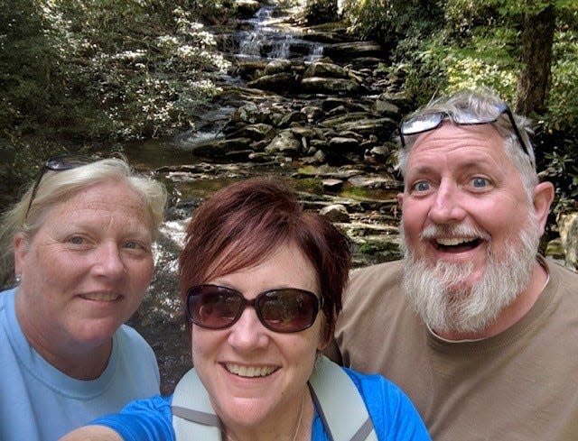 Eric Staats with sisters Teresa Sager, left, and Michele Staats Feldmann on a Smoky Mountains trip in 2019