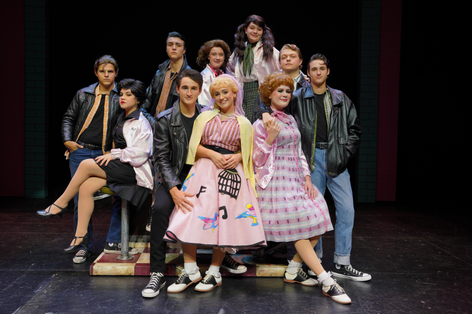 Shane Withrow as "Kenickie," Macy Urso as "Rizzo," Robert Holman as "Sonny," Cooper LaMontagne as "Danny," Karly Dribble as "Marty," Cassidy Cooper as "Sandy," Carlie Frisbee as "Jan," Savannah Lee as "Frenchy," Anderson Law as "Roger
and Conner DeRoche as "Doody" in the musical "Grease," on stage at Cocoa Village Playhouse through Oct. 9, 2022. Visit cocoavillageplayhouse.com.